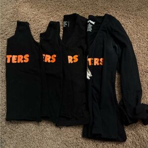 hooters uniforms worn